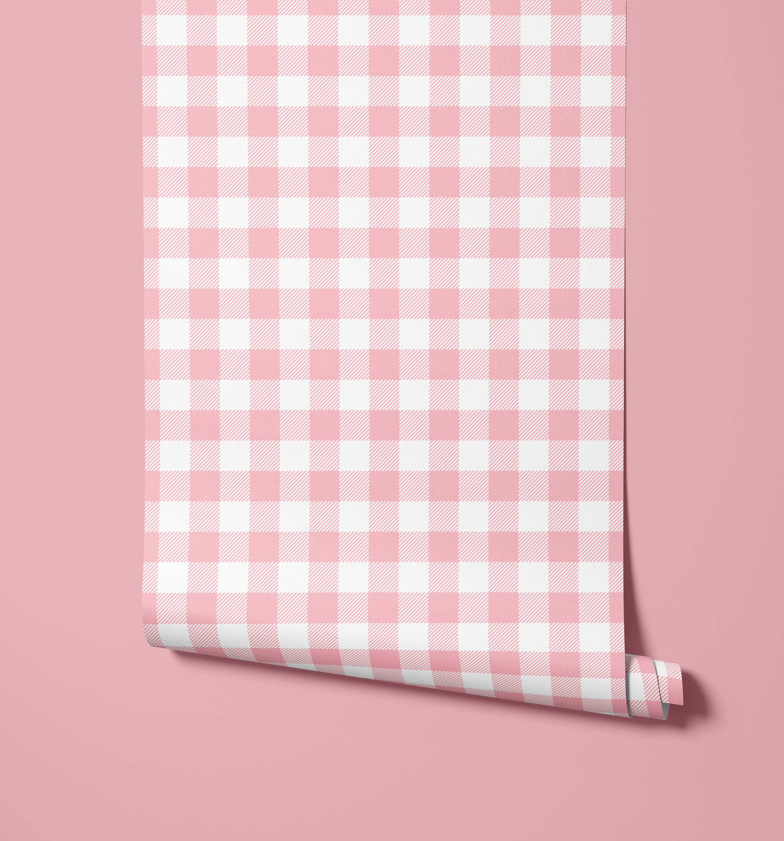 A roll of pink and white gingham wallpaper called picnic perfect for a fresh, classic wall decor look