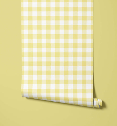 A roll of pale yellow and white gingham wallpaper from the picnic collection perfect for cheerful wall decor