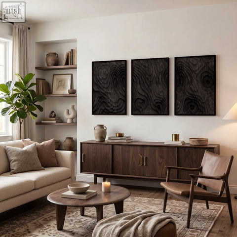 Dark wood sideboard with minimalist design and two-tone brass handles below living room topographic wall art prints set of 3