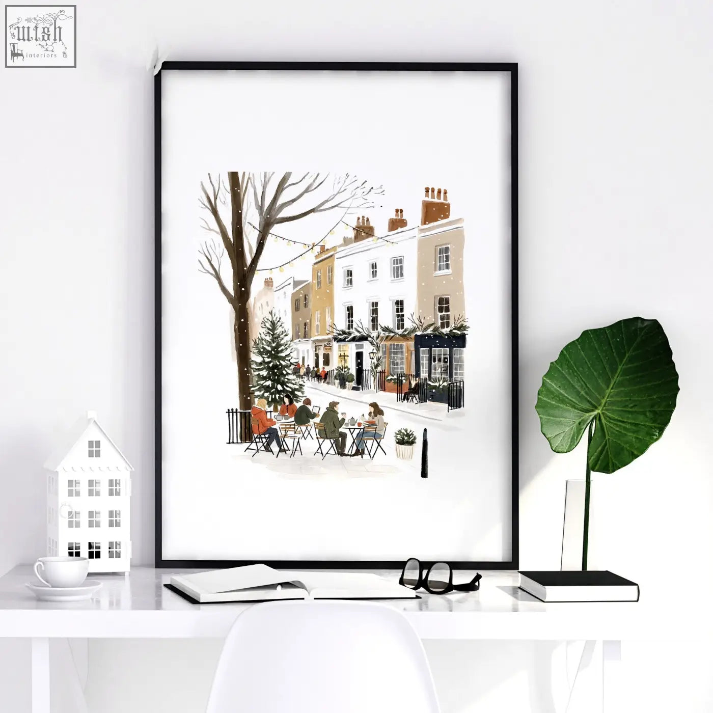 Black-framed illustration print of snowy london street scene with outdoor tables perfect for wall living room decor