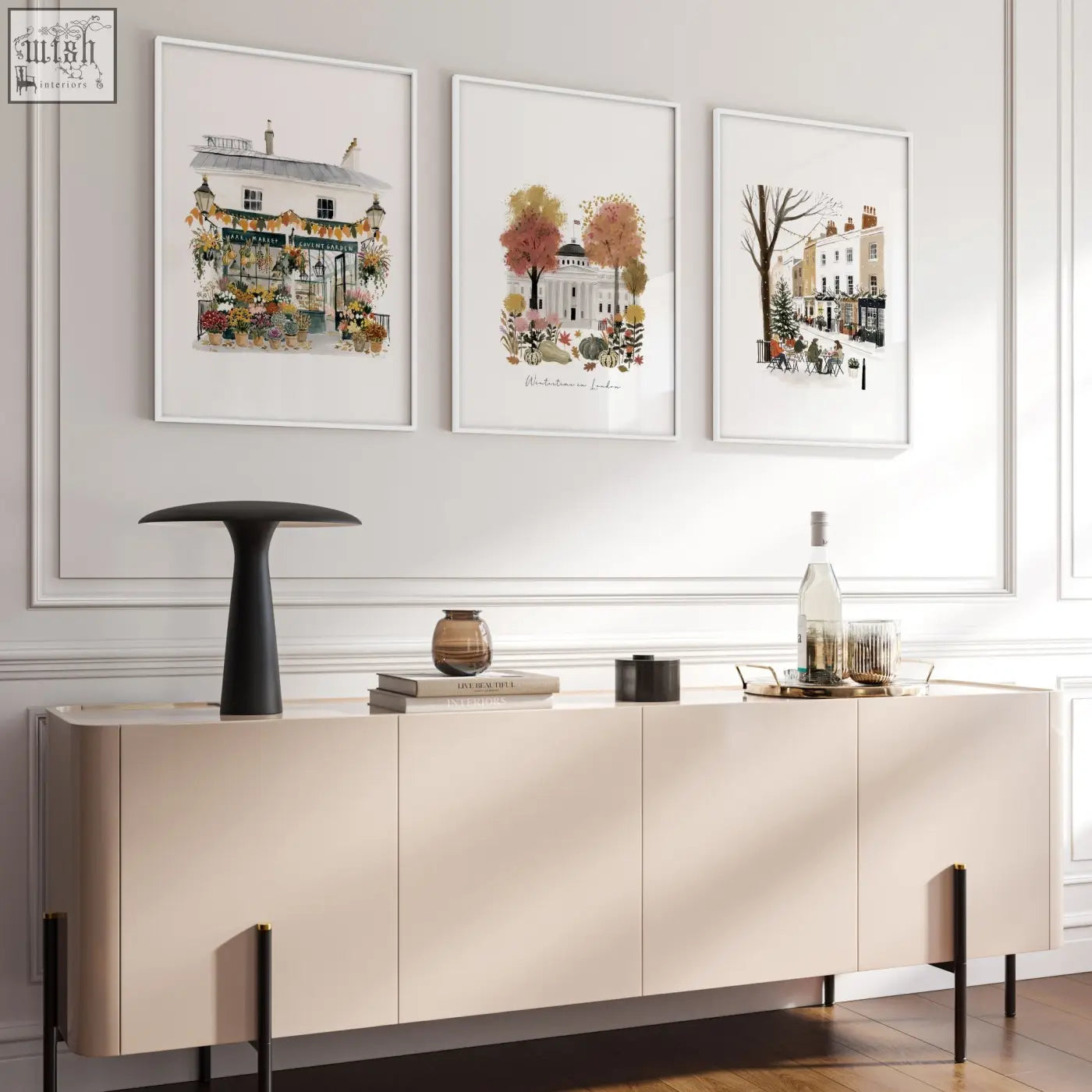 Beige modern sideboard with sleek minimalist design and black legs below wintertime in london wall living room art prints