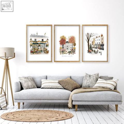 Three framed watercolor prints of london street scenes in light wood frames with white matting for wall living room decor
