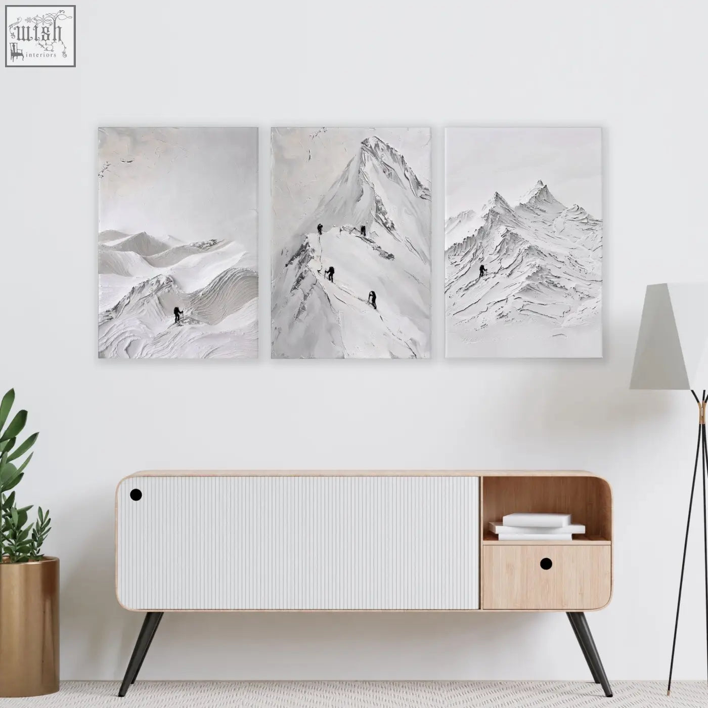 Minimalist white and light wood sideboard with black tapered legs perfect for living room walls with scandi mountain climbers art prints