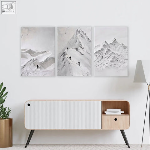 Minimalist white and light wood sideboard with black tapered legs perfect for living room walls with scandi mountain climbers art prints