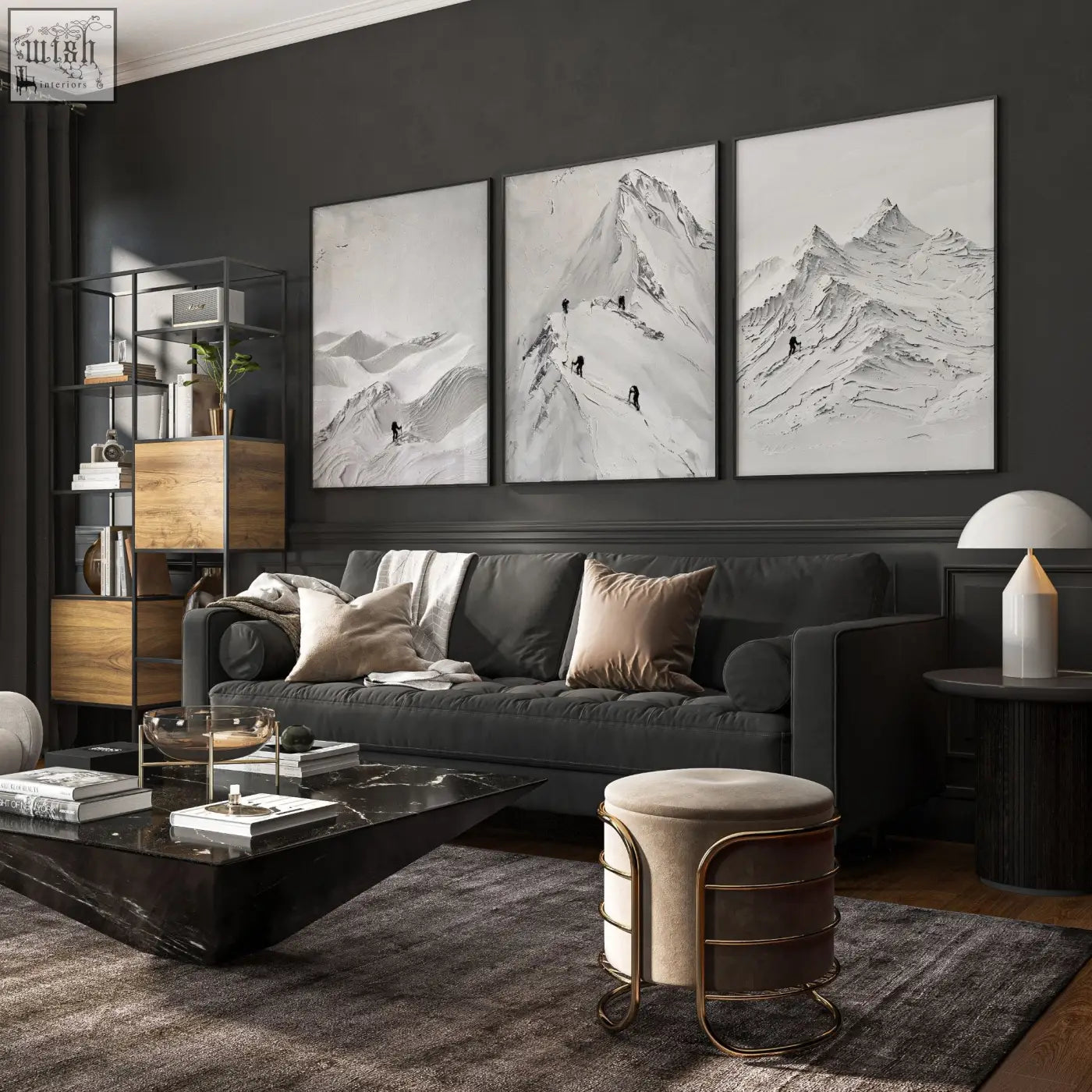 Dark gray upholstered sofa with beige and taupe pillows in front of scandi mountain climbers wall art on living room walls