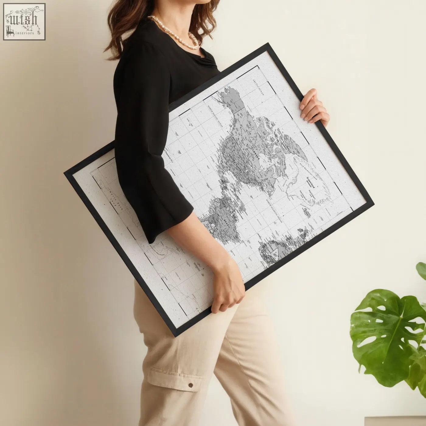 Black-framed vintage grey world map wall art prints with minimalist grayscale design for living room decor