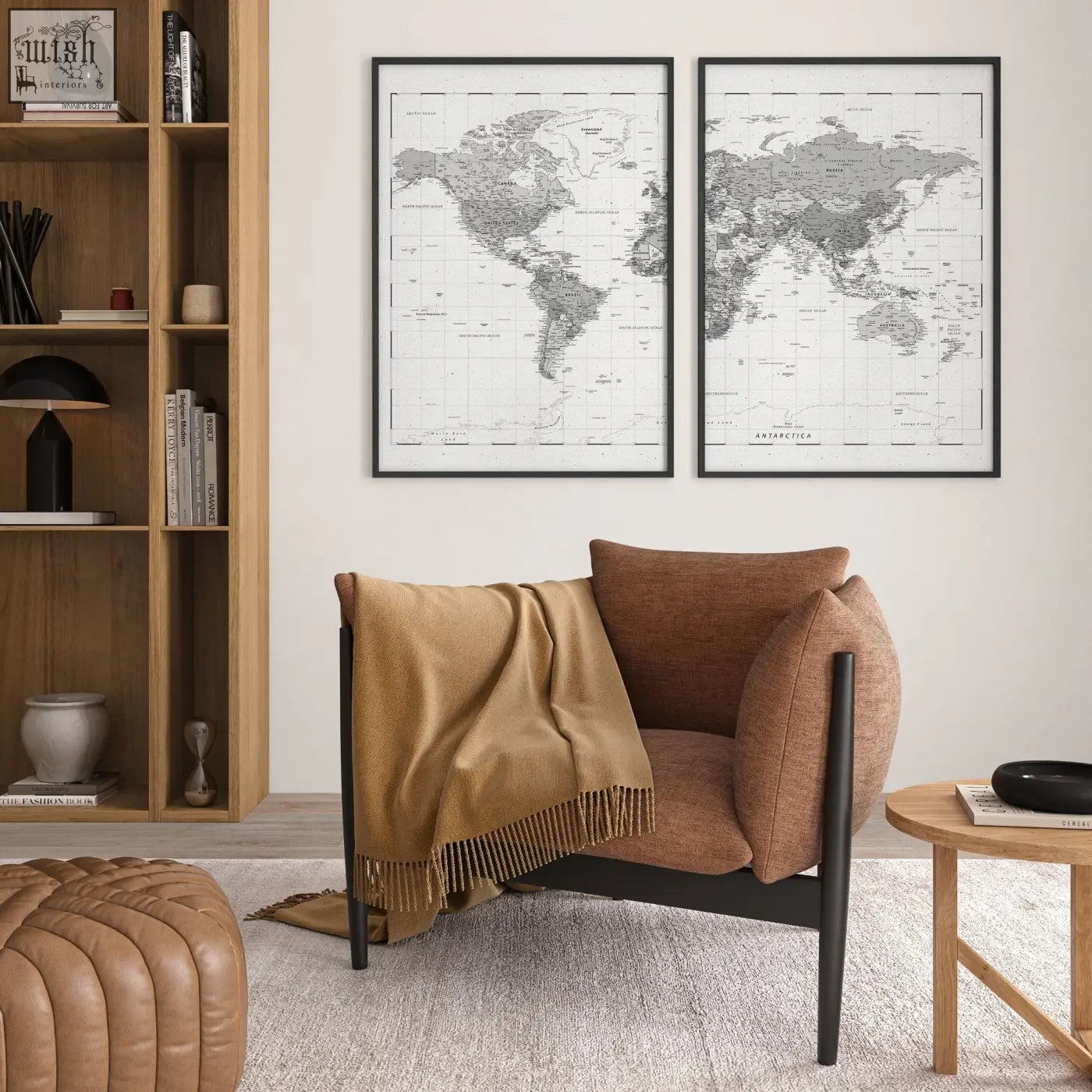 Brown upholstered armchair with black metal legs and tan throw next to vintage grey world map wall art for living room