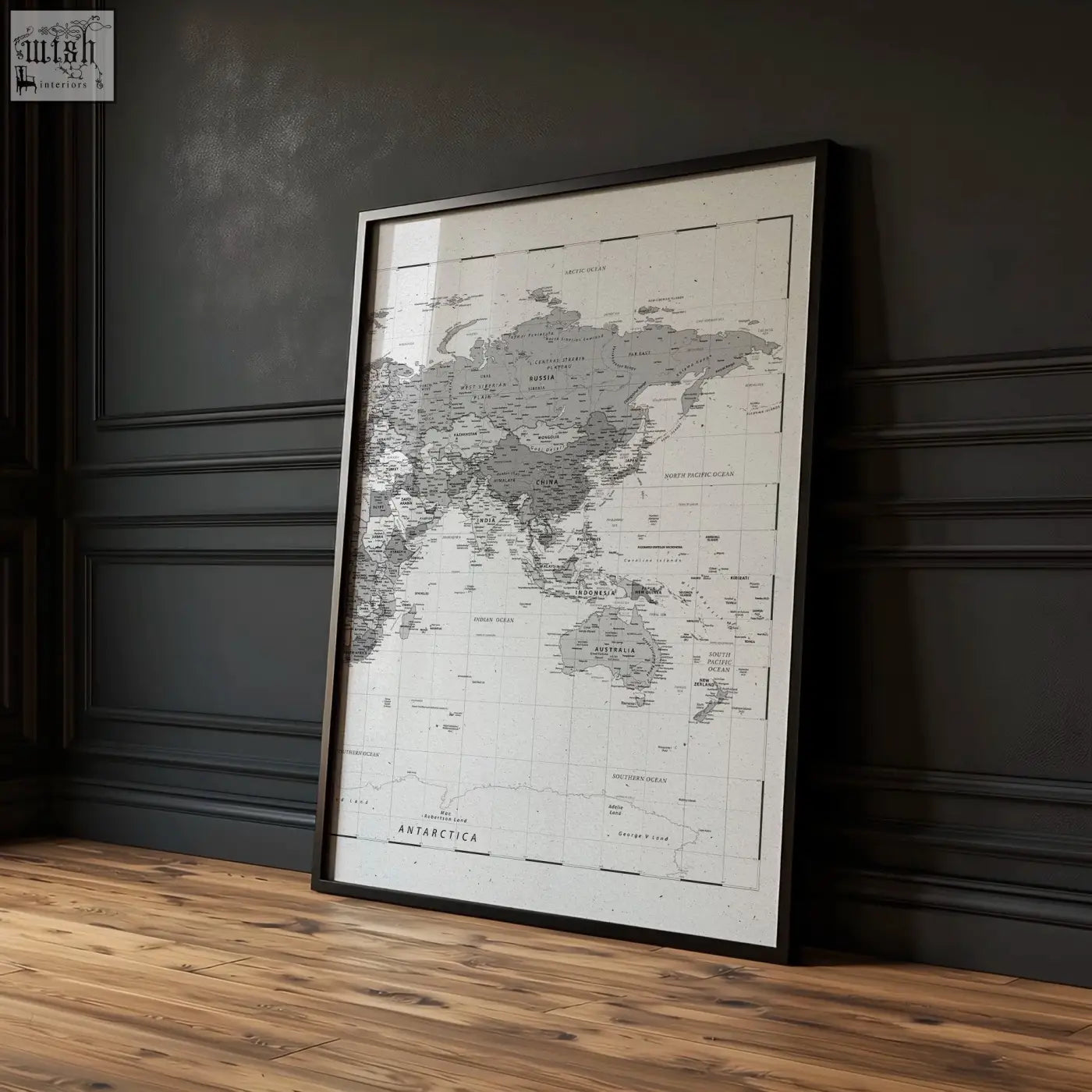 A set of 2 vintage grey world map wall art prints with minimalist design in black frames perfect for living room decor