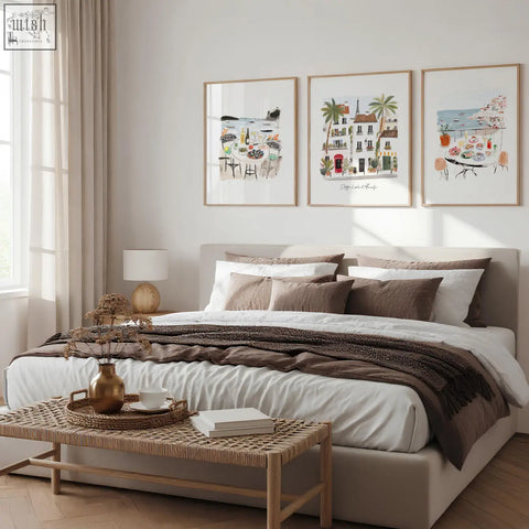 Beige upholstered bed with white and brown bedding featured alongside sotto il sole wall art prints for bedroom decor