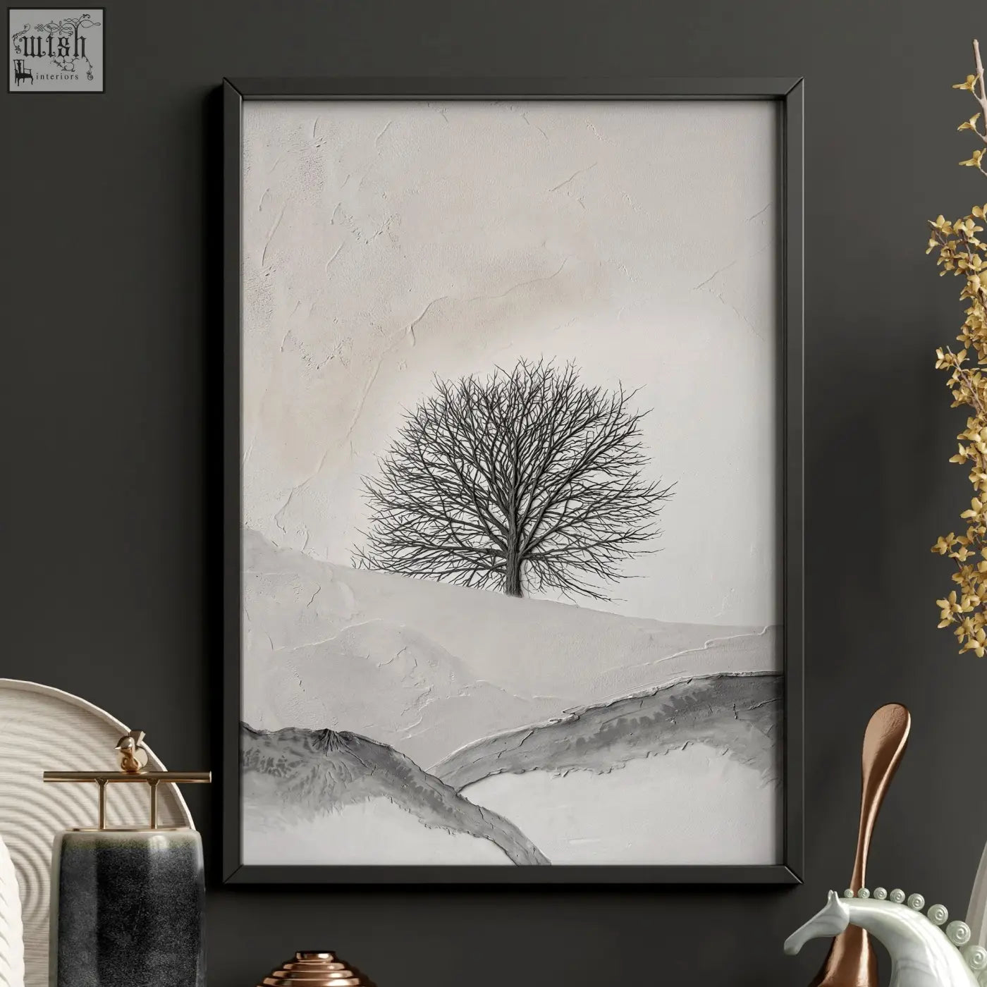 Black-framed minimalist artwork of a solitary bare tree on snowy hills perfect for bedroom wall scandinavian decor