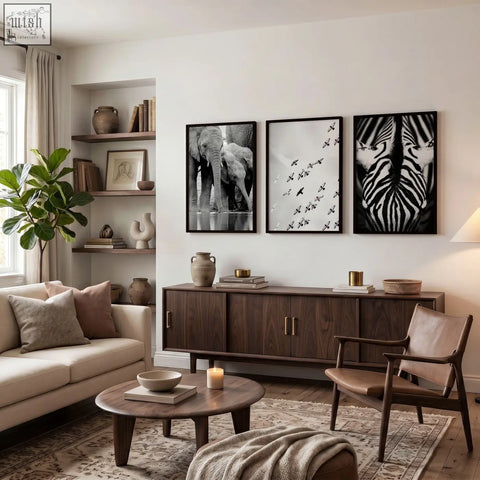 Dark wood sideboard with sleek metal handles and minimalist design styled with books and decor for living room wall white wildlife art prints