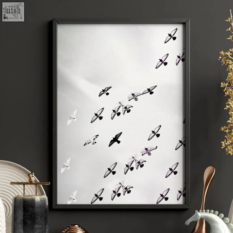 Black-framed monochrome print of birds in flight perfect for living room wall white wildlife safari art prints set