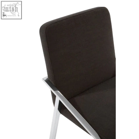 Piermount black dining chair with sleek chrome metal frame and black upholstered seat perfect for black dining areas