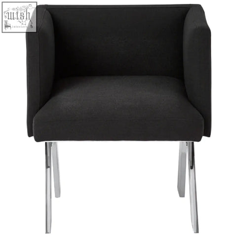 Black dining chair with silver legs featuring comfortable black upholstery and sleek chrome feet for dining use