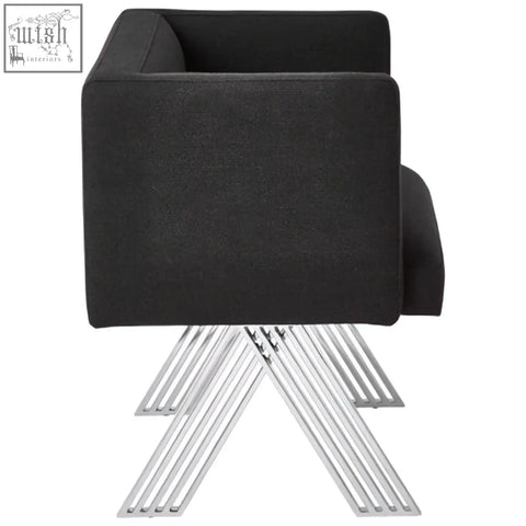 Piermount black dining chair with black upholstered seat and silver legs featuring a modern angular design