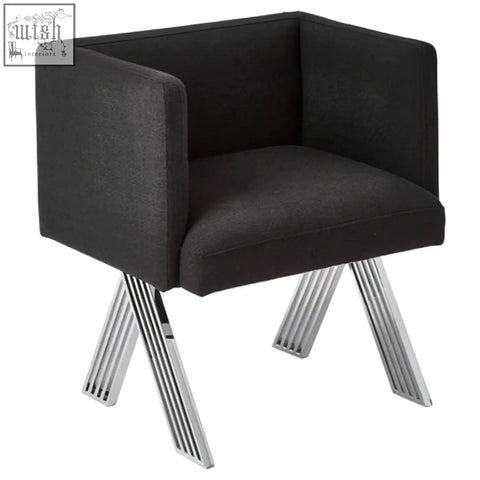 Black dining chair with black upholstery and sleek silver legs perfect for modern dining spaces