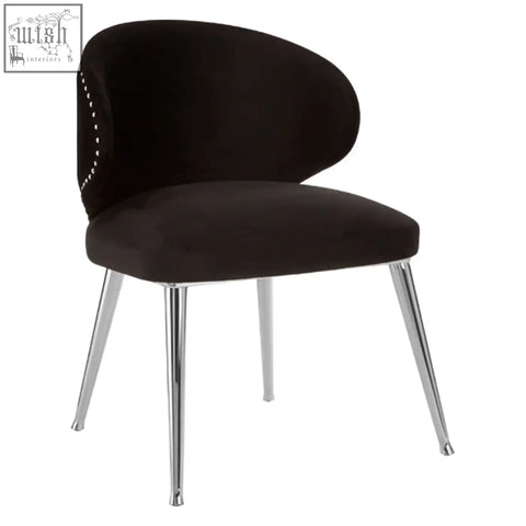 Black velvet piermount dining chair with chrome legs and nailhead trim perfect for dining room seating