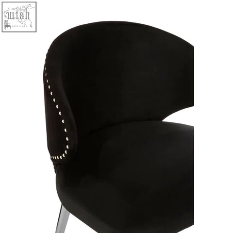 Black velvet piermount dining chair with silver nailhead trim perfect for stylish dining rooms