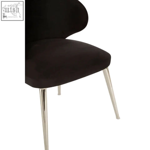 Black velvet piermount dining chair with sleek chrome legs perfect for stylish dining spaces