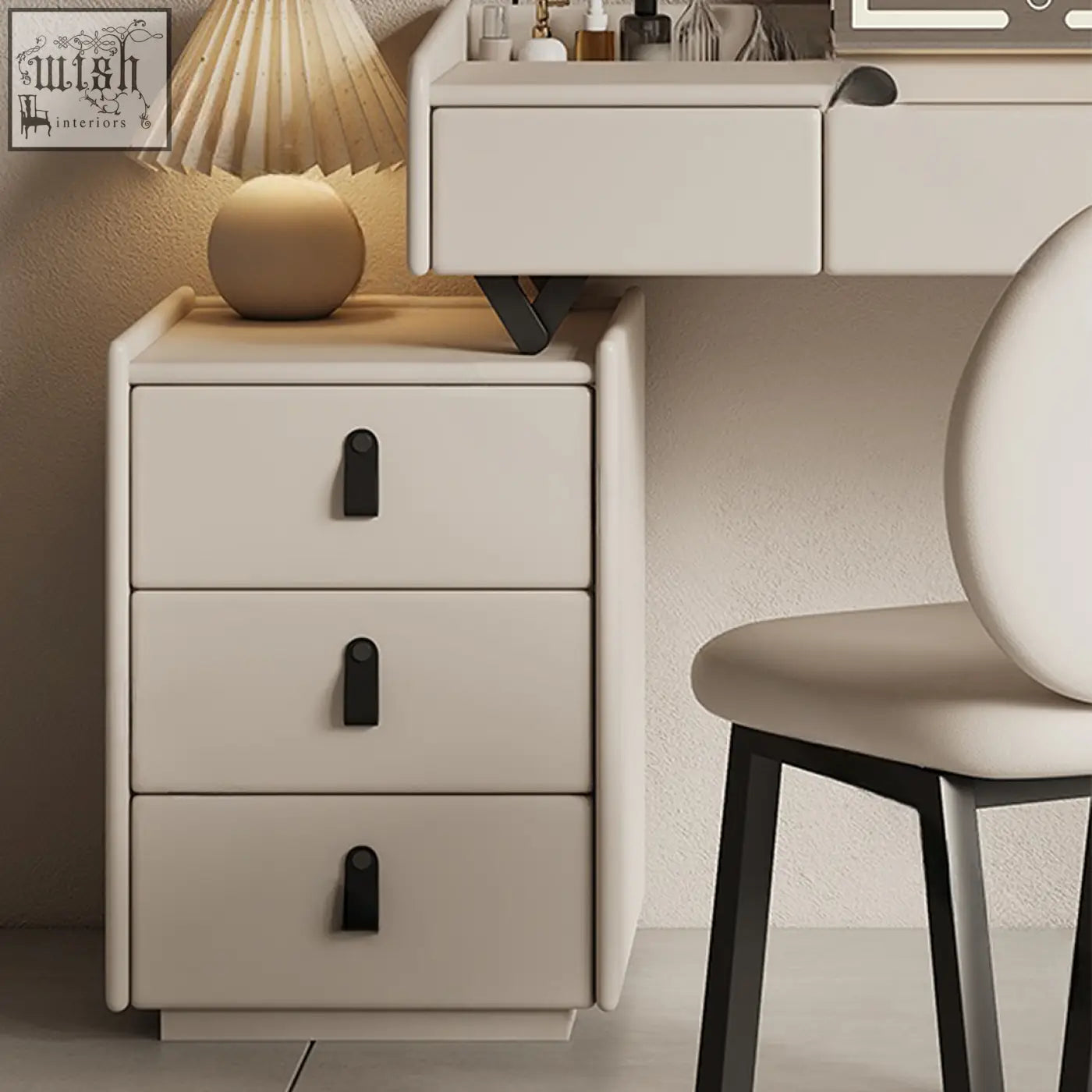 Beige three-drawer nightstand with sleek black handles paired with pilar dressing table led mirror cream