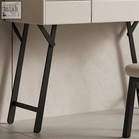 Black metal x shaped legs supporting a cream pilar dressing table with led mirror and drawers, perfect for shipping cost savings