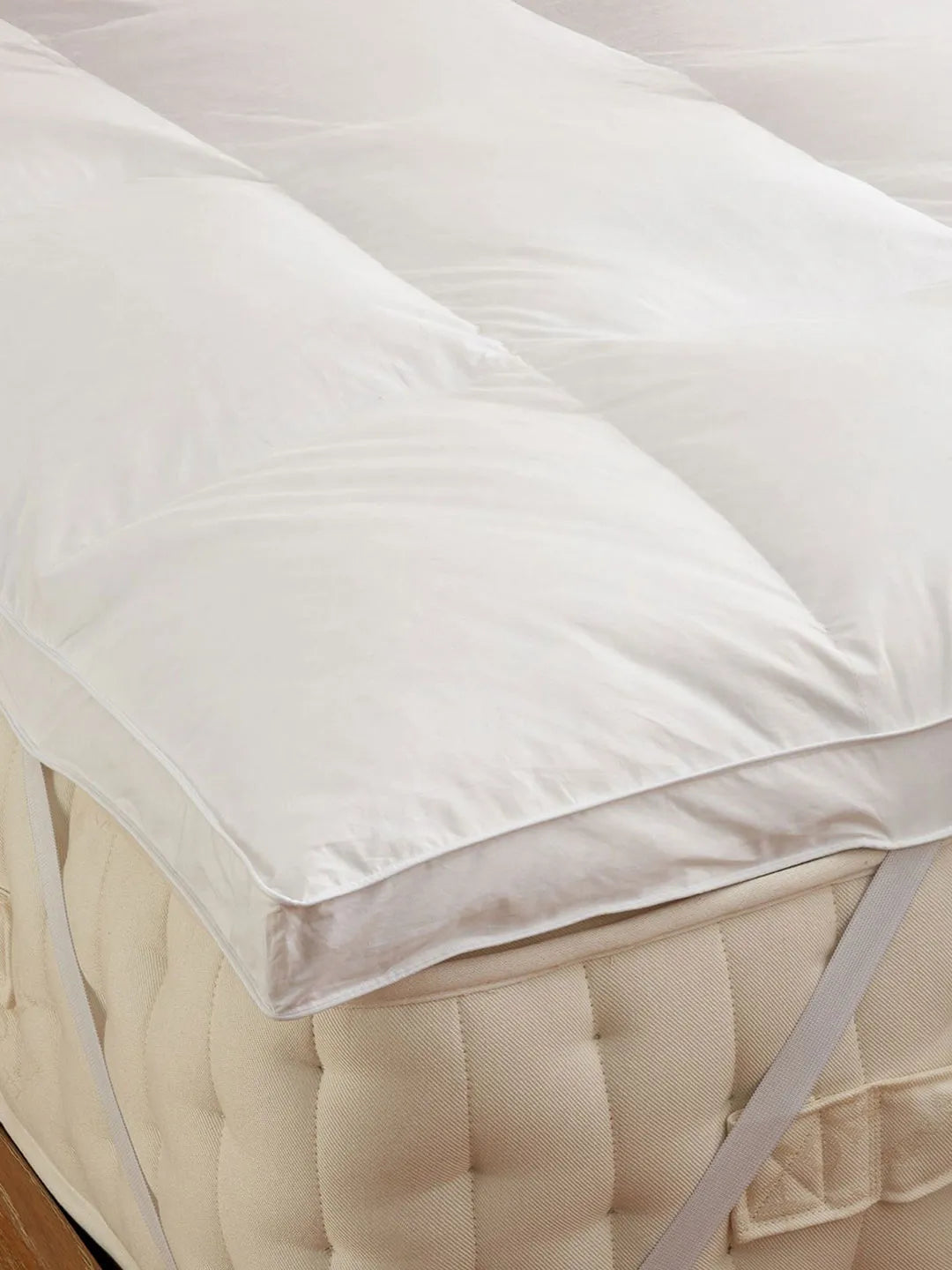 White quilted pillowpillow luxury mattress topper with duck feather filling and elastic straps for secure sleep solutions