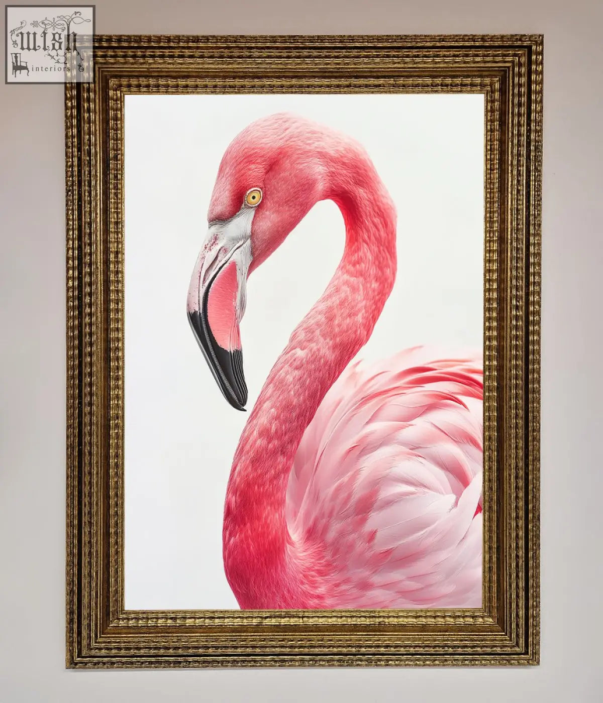 A vibrant pink flamingo stare framed print with a gold ornate frame perfect for stylish wall decor