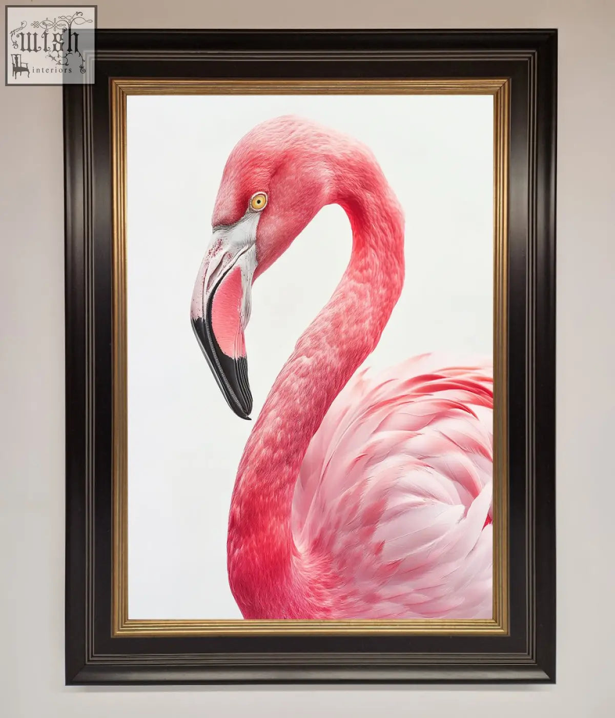 A vibrant pink flamingo stare framed print in a sleek black frame with gold inner trim perfect for wall decor