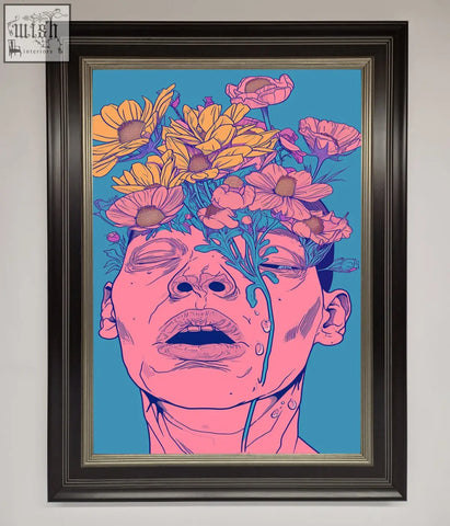 A vibrant pop-art framed wall art showing a face with yellow and pink flowers on a teal background