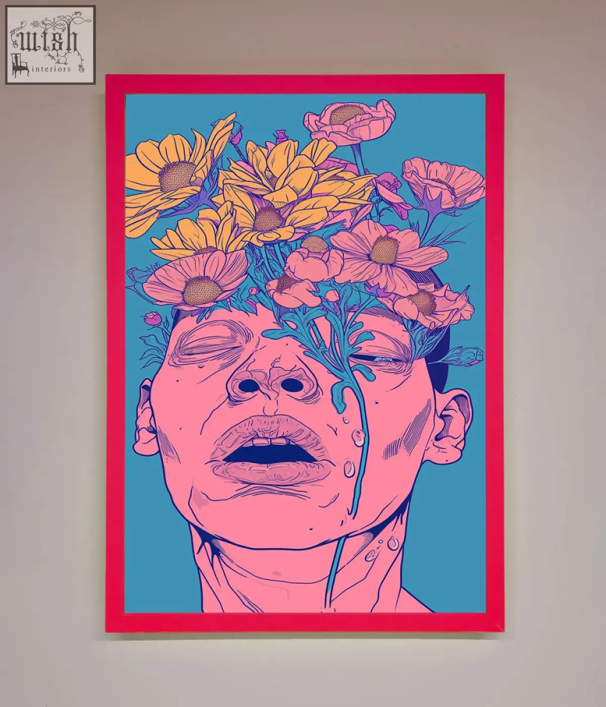 Vibrant pink flowers on face framed wall art featuring a blue and pink face with flowers growing from its head in bold red frame