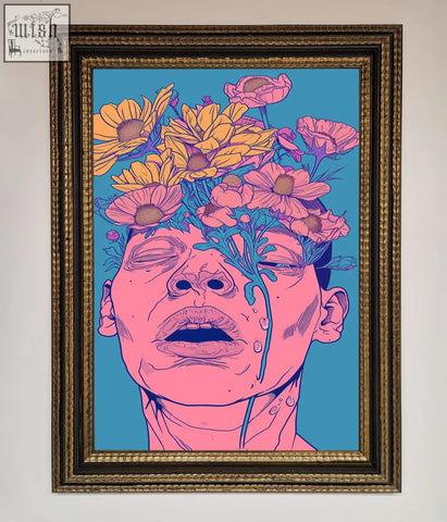 A vibrant pop-art pink flowers on face framed wall art with a gold-leaf frame and teal background