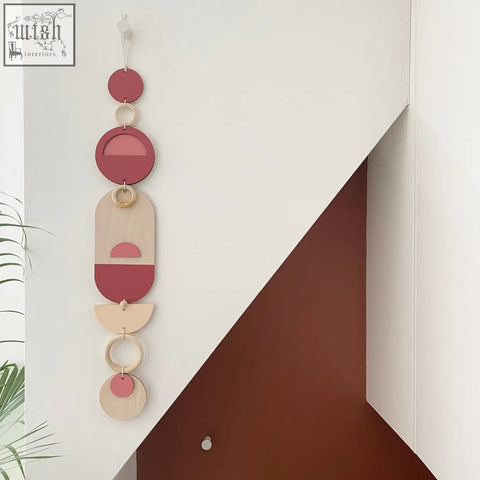 Minimalist modern wall art with stacked geometric shapes in terracotta and natural wood tones for stylish home decor
