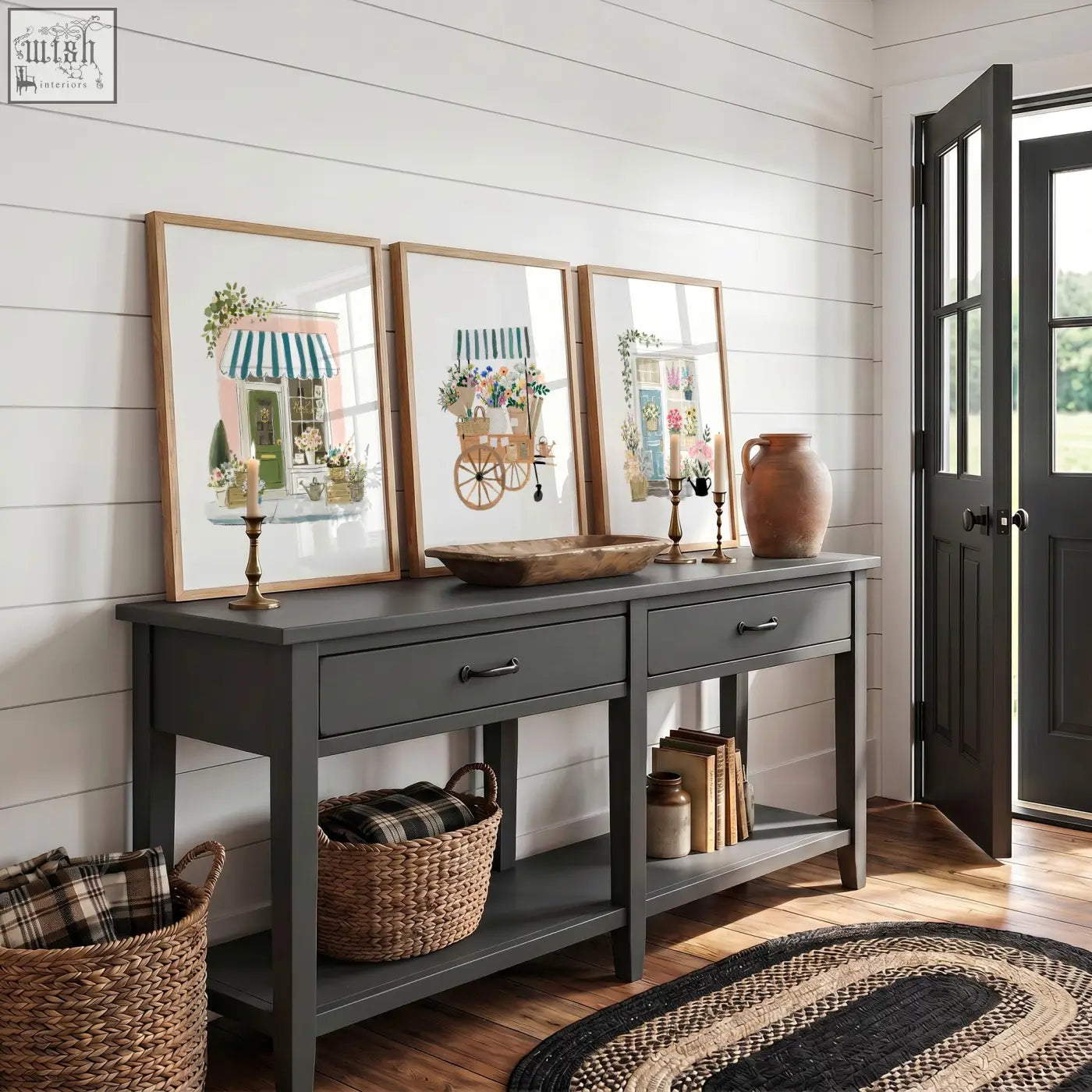 Dark gray console table with two drawers and rustic wooden top shown with pink picture flower shop art prints set of 3