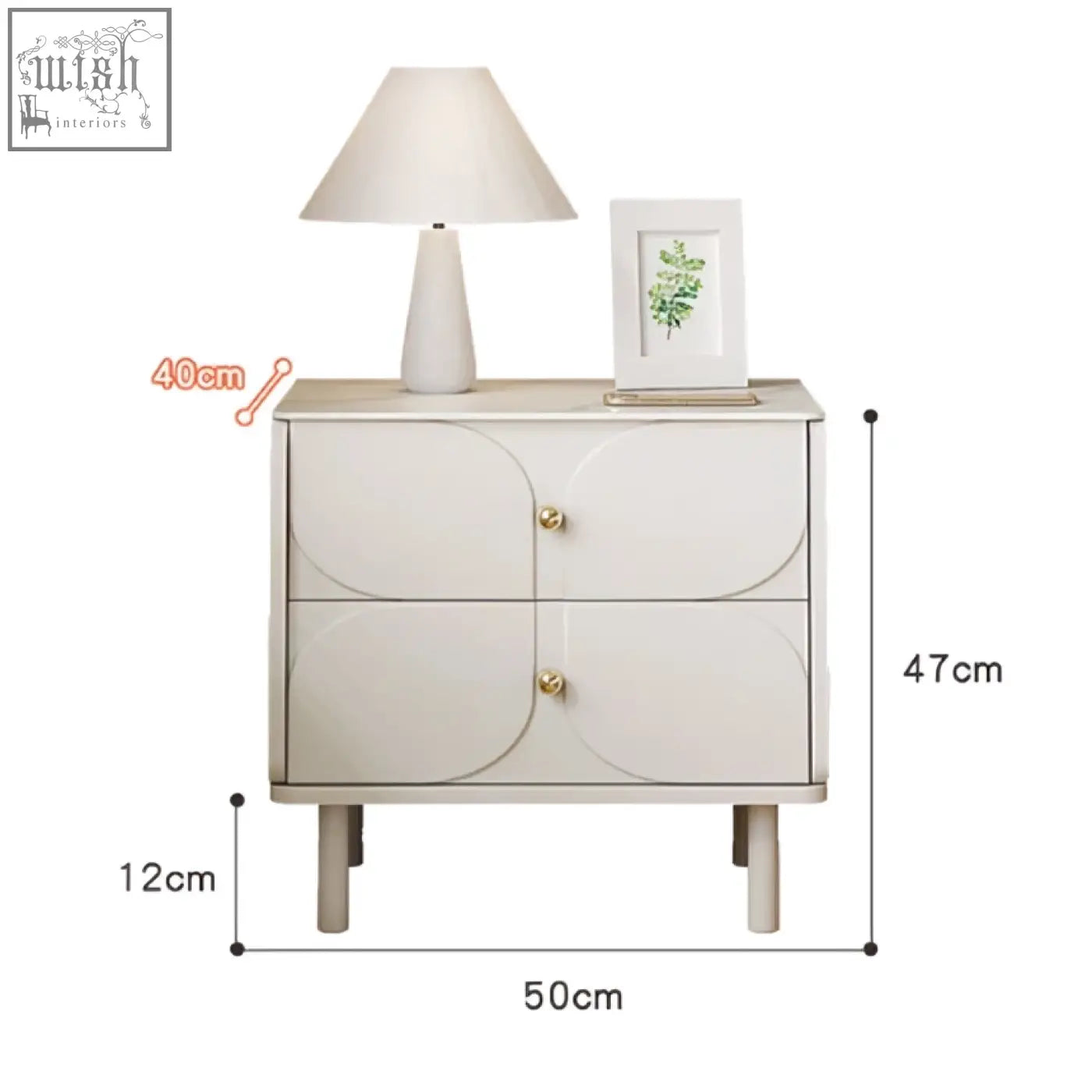 Cream-colored placebo bedside table with two curved drawers gold knobs and minimalist legs for modern bedrooms