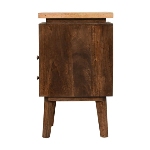 Rustic dark wood platform bedside table with lighter wooden top and two drawers with black metal handles