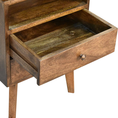 A rustic wooden platform bedside table with warm natural finish and tapered legs perfect for bedroom use