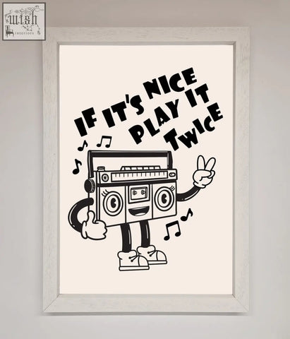 A framed wall art featuring a black and white cartoon boombox with arms legs and facial features play twice design