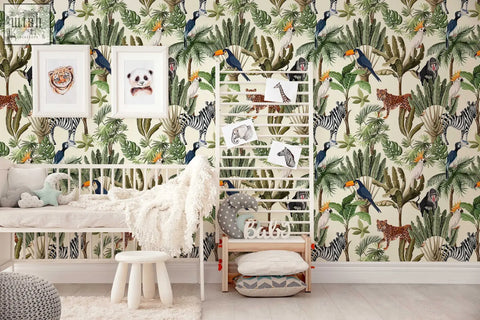 White wooden crib with soft bedding and plush toys against playful jungle animals traditional paper wallpaper for nursery