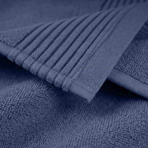 Deep blue plush towels set with ribbed edge and soft absorbent weave perfect for everyday use