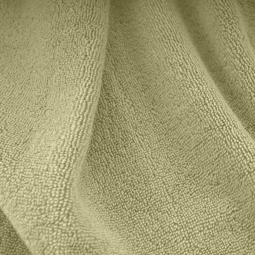 Soft olive green terry cloth towel with plush textured surface from plush towels set