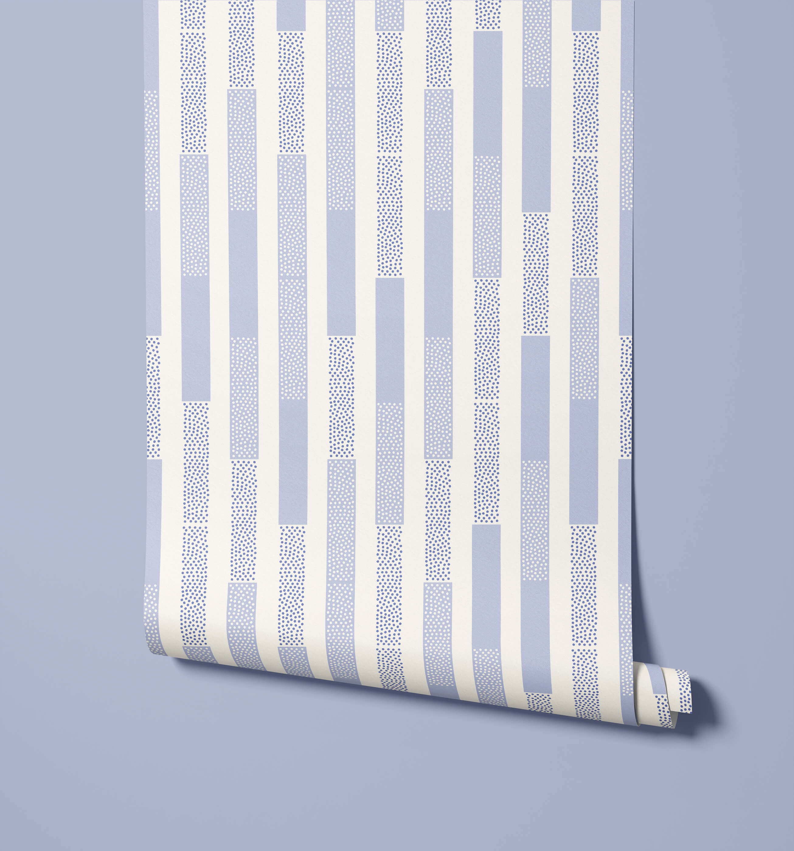 A roll of polka wallpaper with light blue and white stripes and dotted patterns perfect for room decor