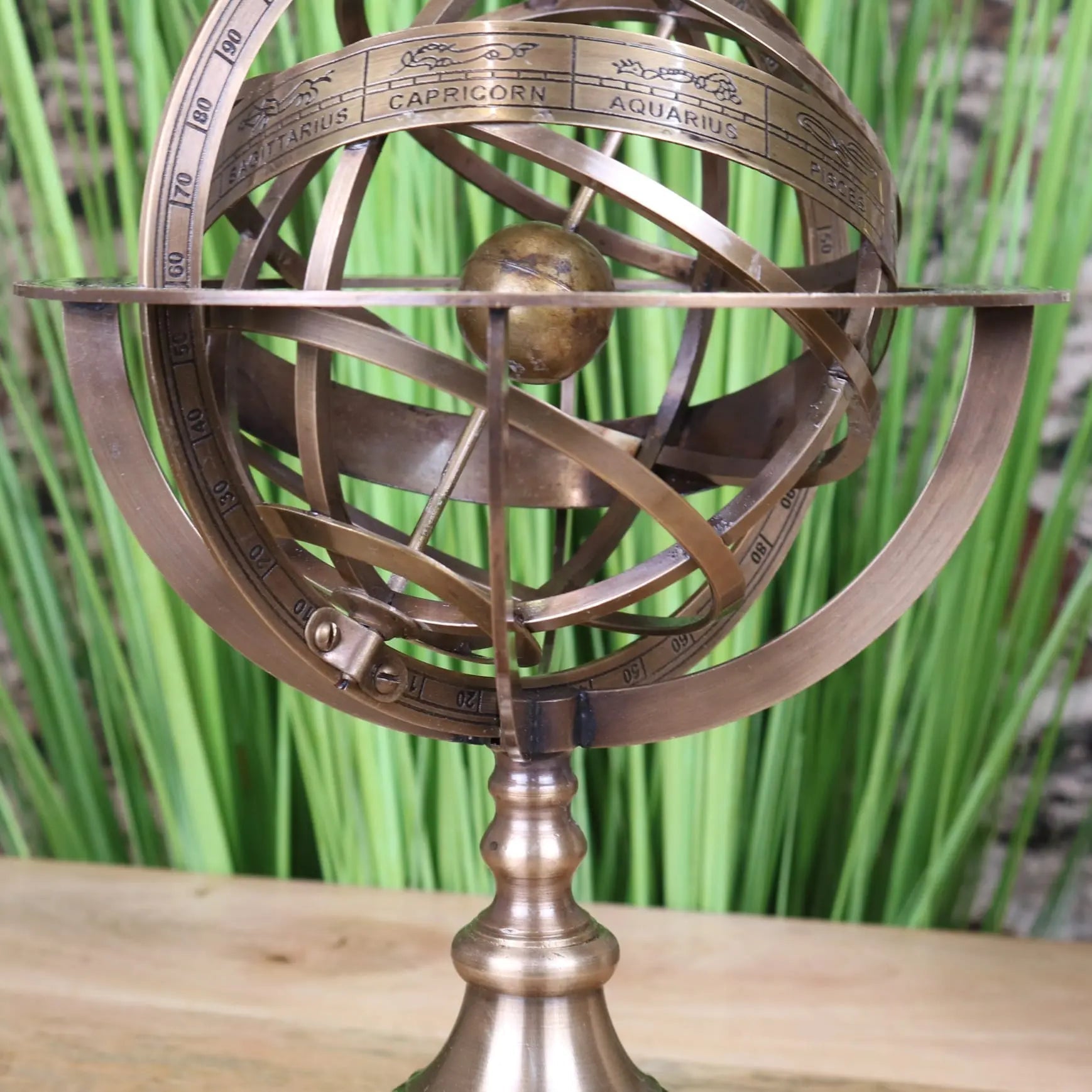 Antique brass armillary sphere ornament 30cm with engraved zodiac signs and degree markings by ponnur