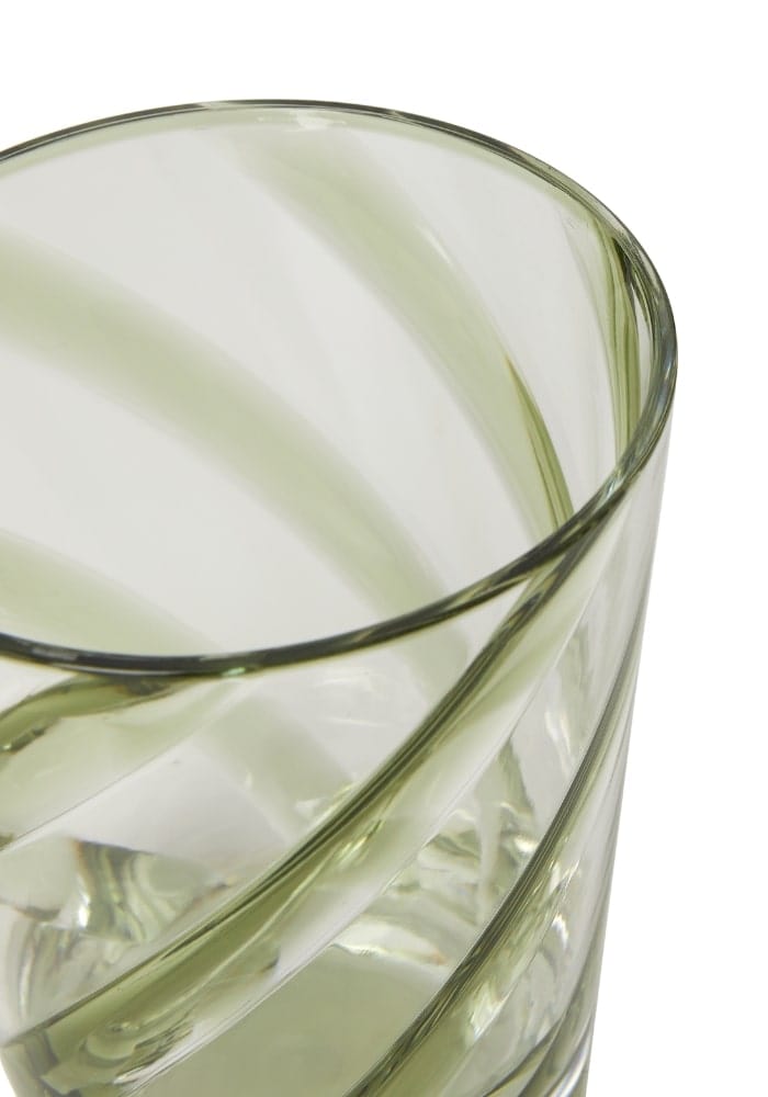 A poolside gossip green acrylic tumbler with a clear glass look and twisted ridges for a stylish touch