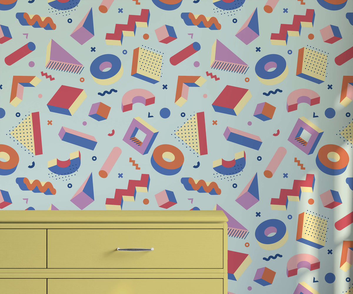Vibrant geometric-patterned wallpaper pop in pastel blue with bold red purple and orange shapes for stylish walls