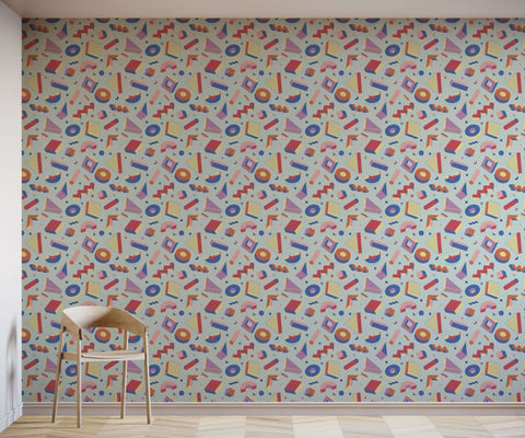 Pop wallpaper with vibrant retro geometric shapes in bold red blue pink and orange on a light gray background