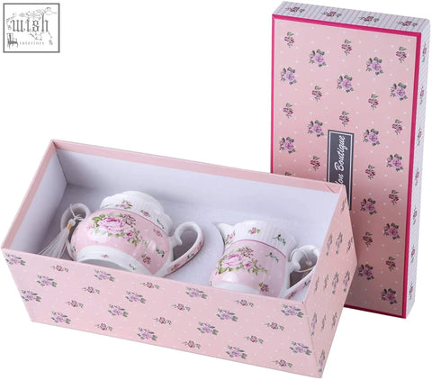 Pink porcelain teacup with matching sugar bowl and cream milk jug in a shabby chic floral gift box