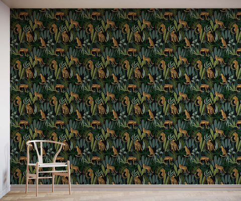 A white wooden porta chair with a minimalist curved backrest in front of a dark green wall with golden cheetahs