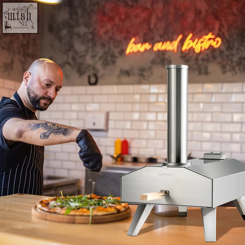 Silver stainless steel portable outdoor pizza oven with tall chimney and angled legs for camping picnic use