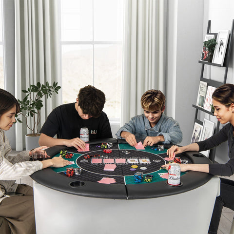 Black and white circular poker table with green felt and cup holders included with carrying bag for easy transport