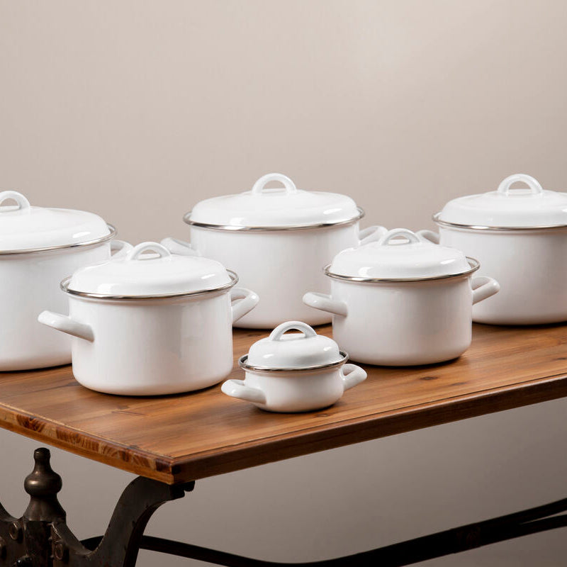 Set of white enamel 10cm mini metal casserole pots with silver rims and handles perfect for cooking small dishes